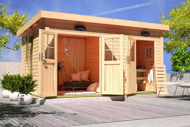 Karibu Woodfeeling Niska mit Lounge Ein großes Saunahaus mit einem Separaten Aufenthaltsraum oder einer Lounge bietet maximalen Comfort