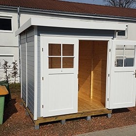 Beispiel eines Gartenhauses mit Pfahlfundament Beispiel eines Gartenhauses mit Pfahlfundament