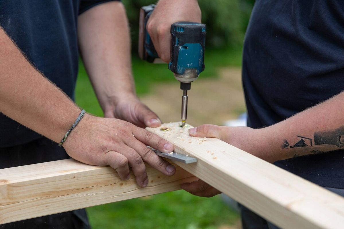 Ein Teil des Klettergerüsts ist eine richtige Leiter mit Holzsprossen