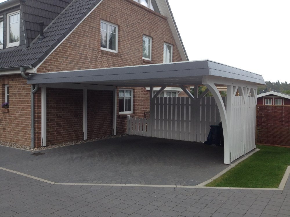 Doppelcarport mit Wandanbau Doppelcarport an einer Hauswand